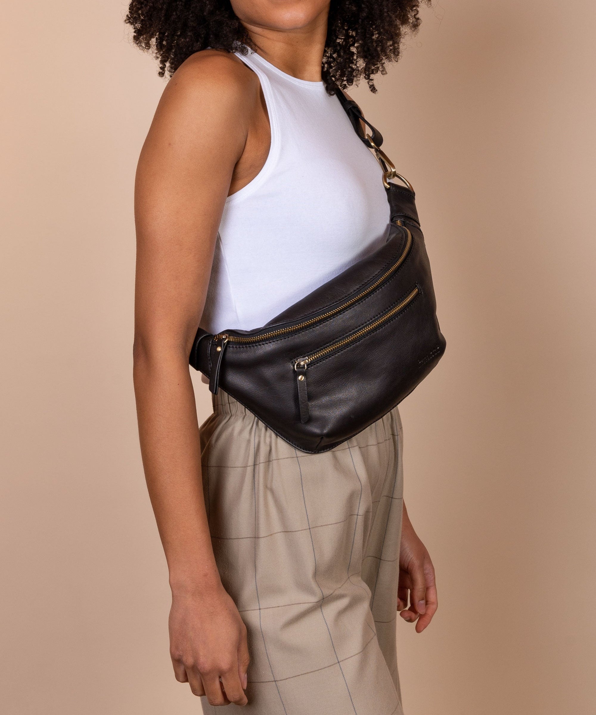 DrewBumBag_Black_SoftGrain_FemaleModel_2.jpg