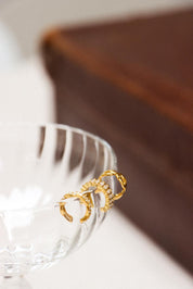 Shiny braid ear cuff