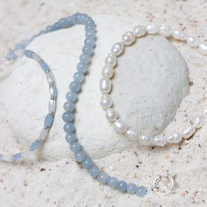Armband - Light blue beads goud of zilver