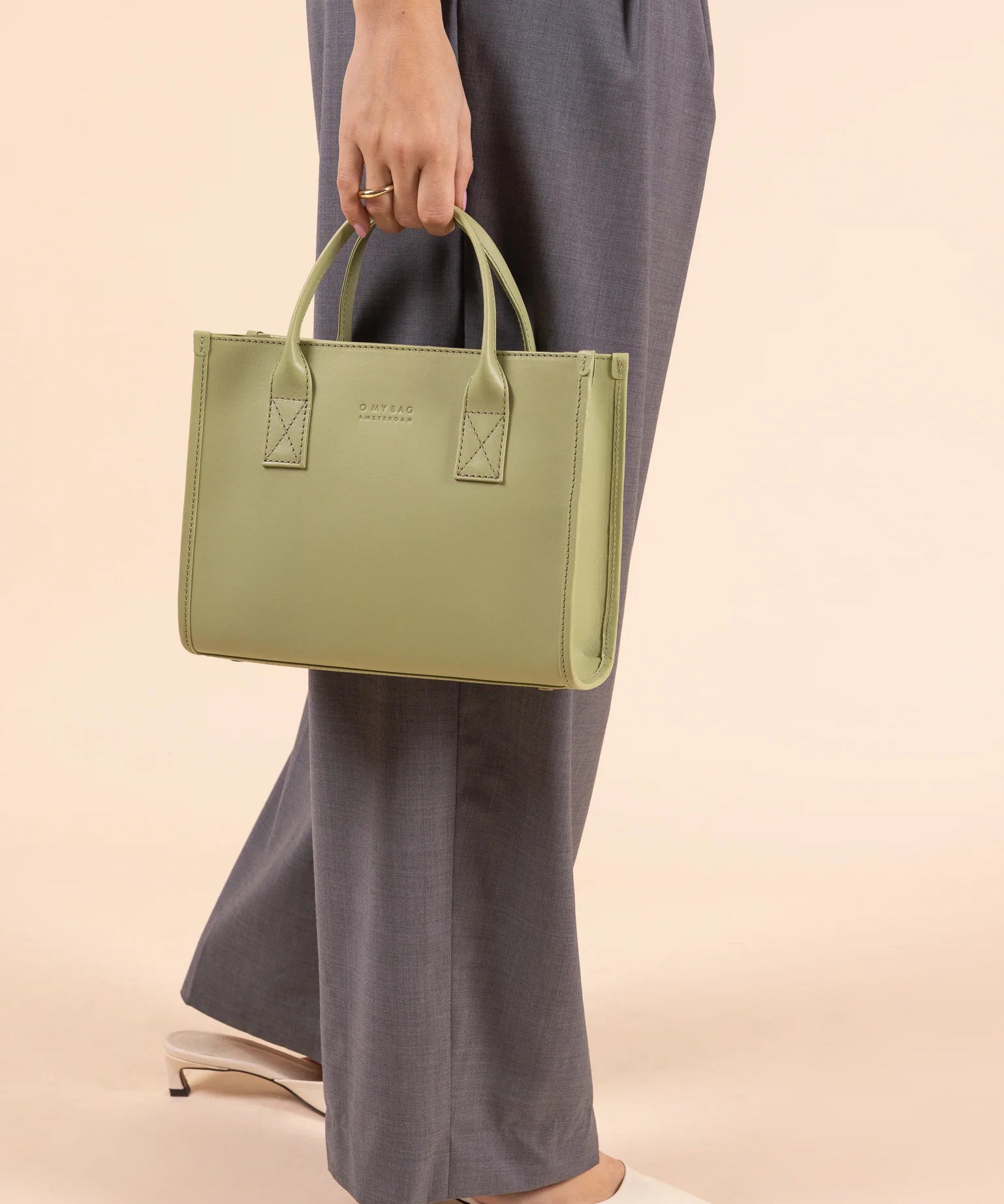 Jackie-Midi-Tea-Green-Ecom-Model-4_a6e0d004-f565-49d6-a6bf-663570659518.webp