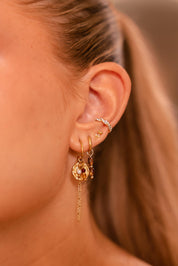 Shiny braid ear cuff