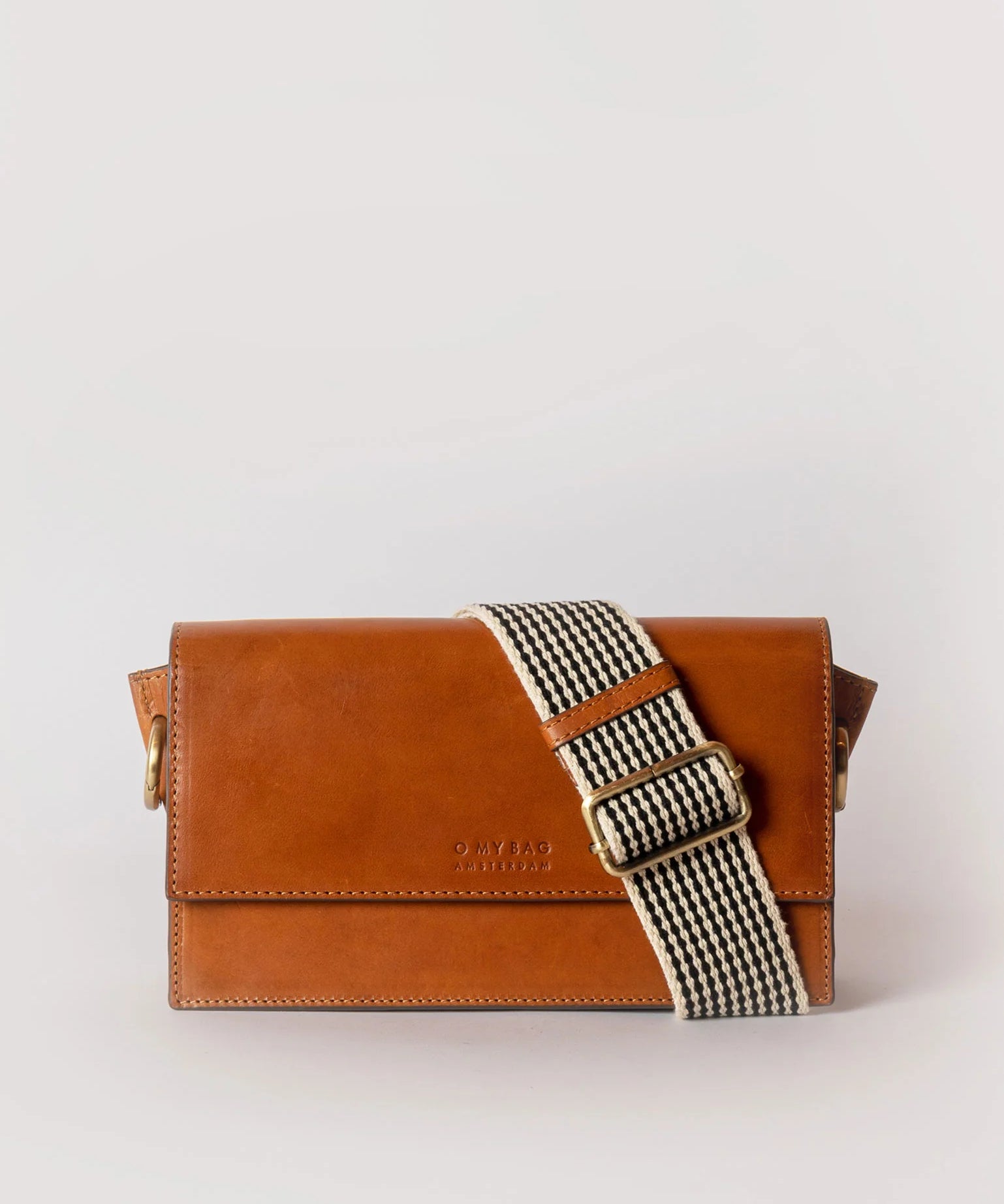 Stella_CognacClassic_CheckStrap.webp