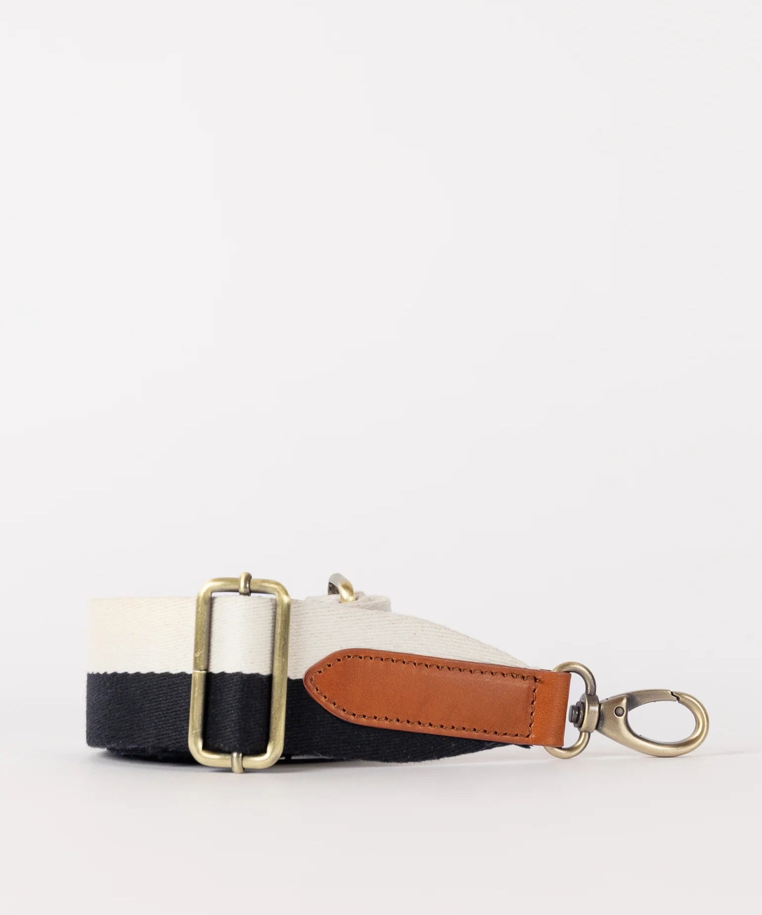 Striped-Webbing-Strap-Black-_-White-Cognac-Classic-Leather-Front.webp