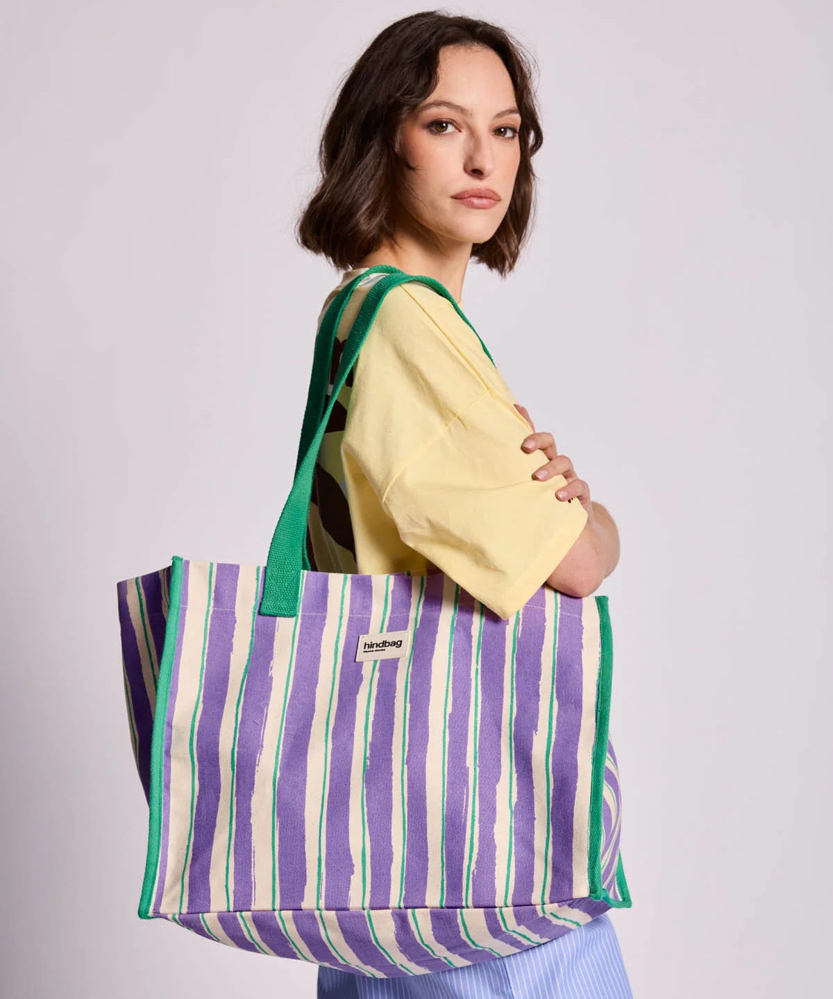 claude-stripes-hindbag-model.webp