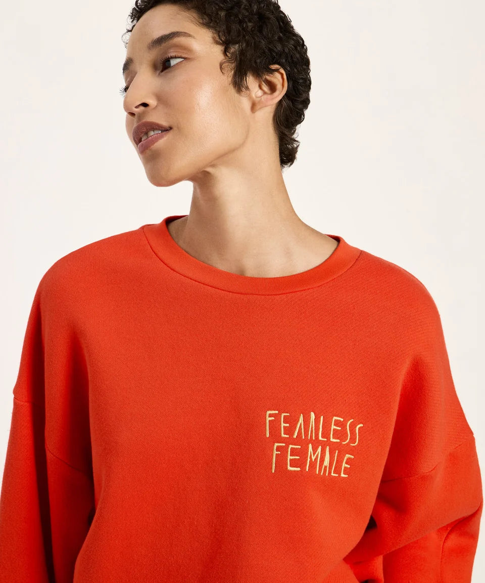 fearless-female-sweatshirt-model.webp