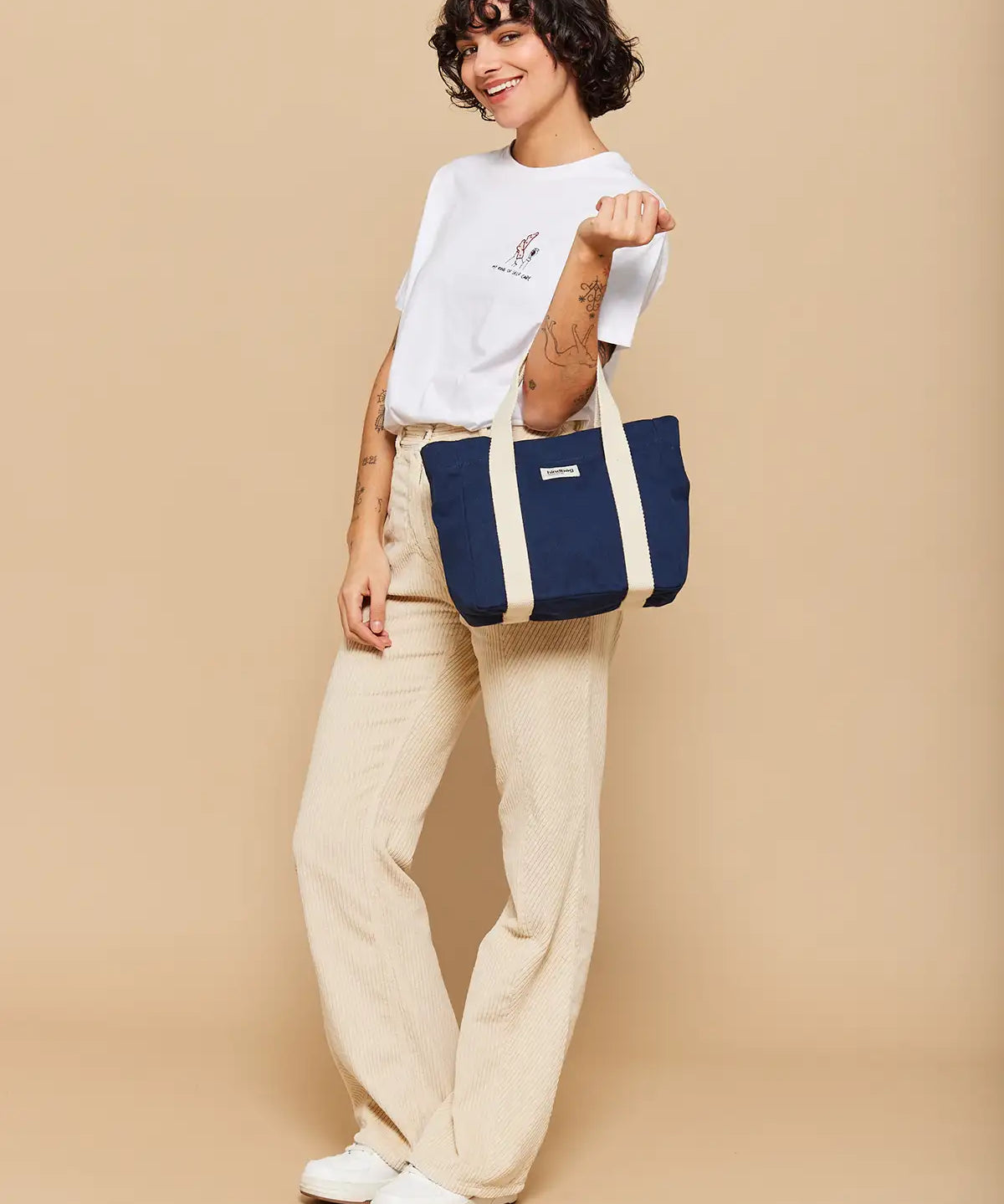 louise-mini-cabas-navy_1296x_cf4fafde-3d45-409b-9143-cfd873f7e304.webp